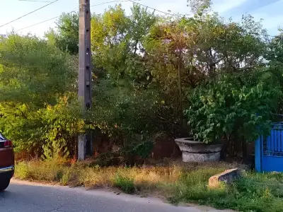 Teren intravilan poarta albastra Potlogeni Vale Dambovita